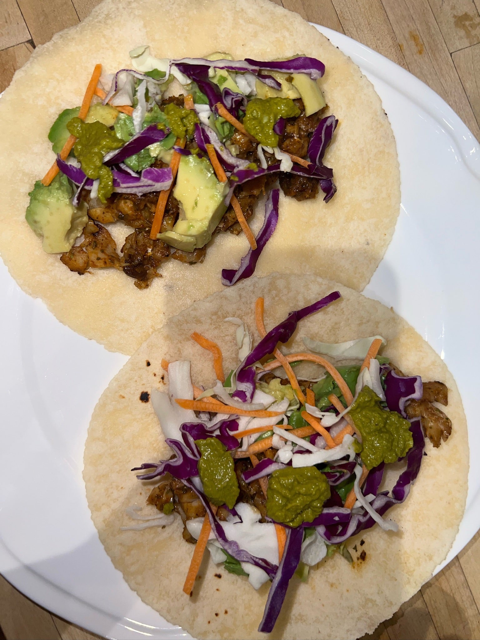 fish tacos with cabbage slaw, avocado and afghan green chutney